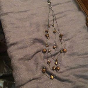 Black and copper, 3 strand costume necklace. 18” with 2” extender